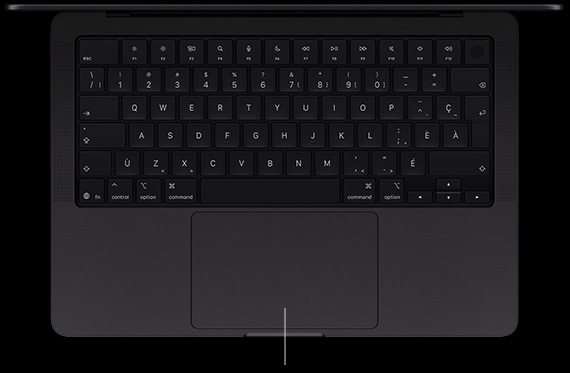 MacBook Pro avec écran PROLED XDR, couleur noir infini, ouvert, montrant le clavier et le pavé tactile Force Touch