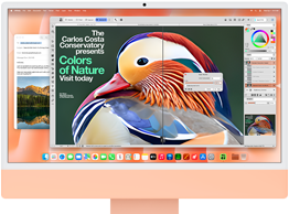 Oranžový iMac, pohled zepředu, na displeji aplikace na upravování obrázků s nástroji AI, na pozadí aplikace Mail