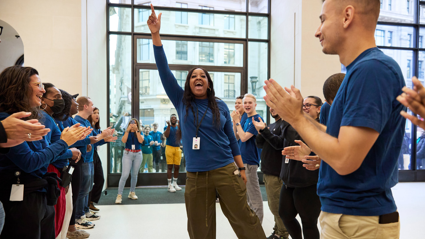 Team members greet customers at Apple Regent Street in London.