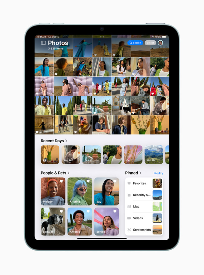 Den redesignede Fotos-app vist på iPad mini.