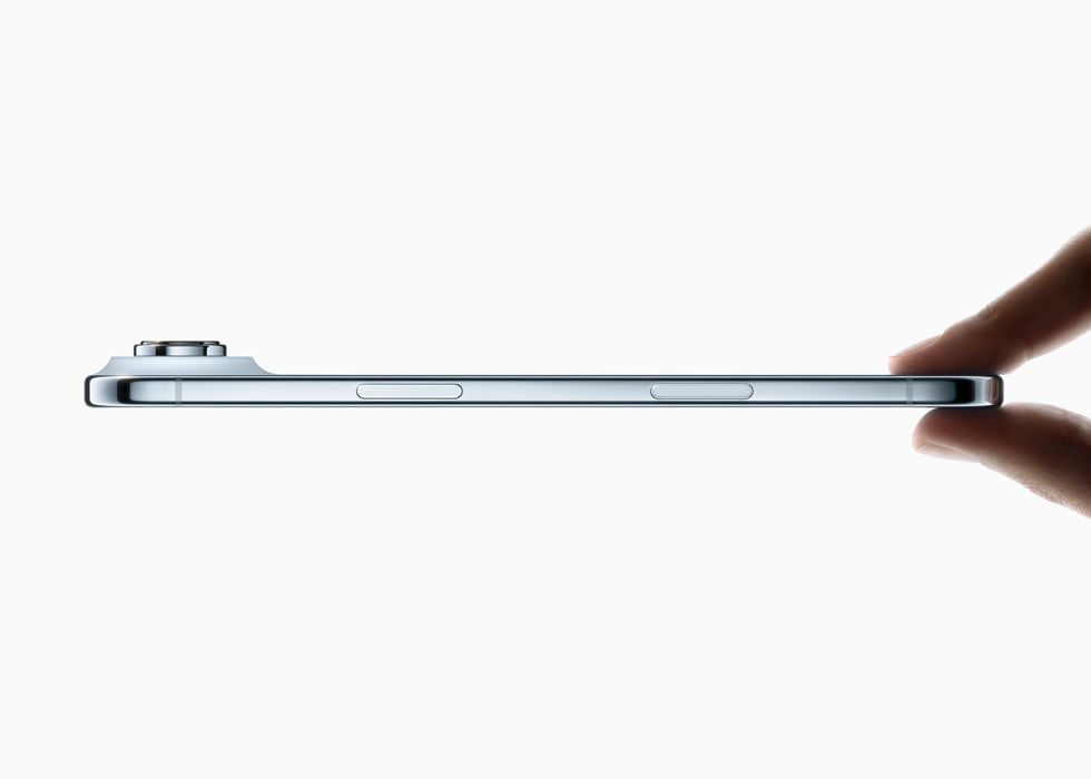 A person holds up iPhone Air between two fingers, emphasizing with this side profile view how thin the device is.