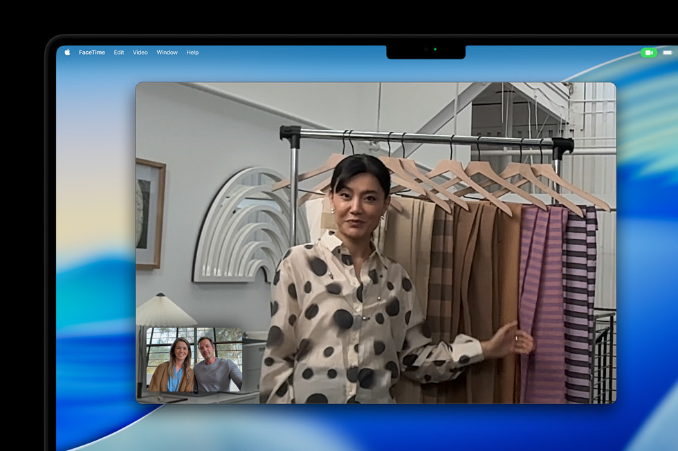 MacBook Pro shows a video call.