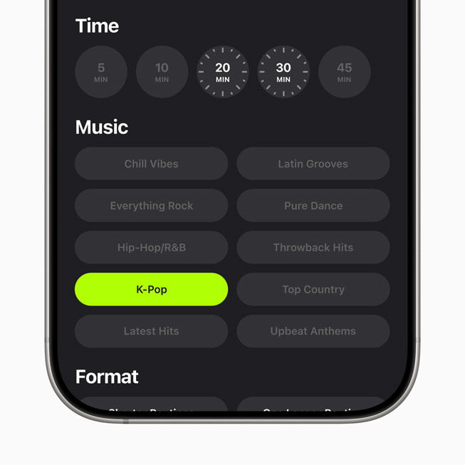 On a close-up on a user’s iPhone 17 Pro, Apple Fitness+ shows the new K-Pop genre.