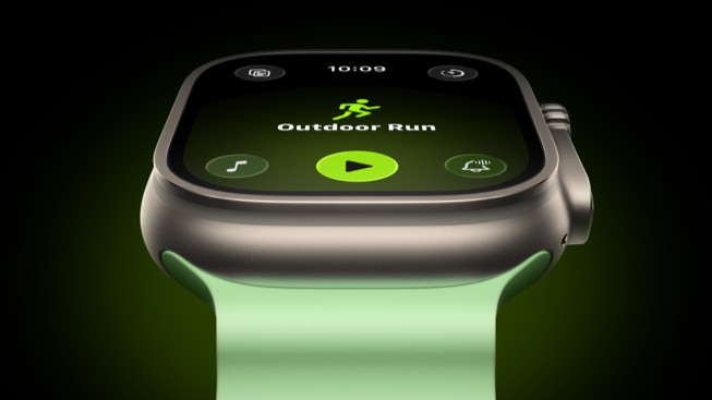A closeup of Apple Watch shows an Outdoor Run.
