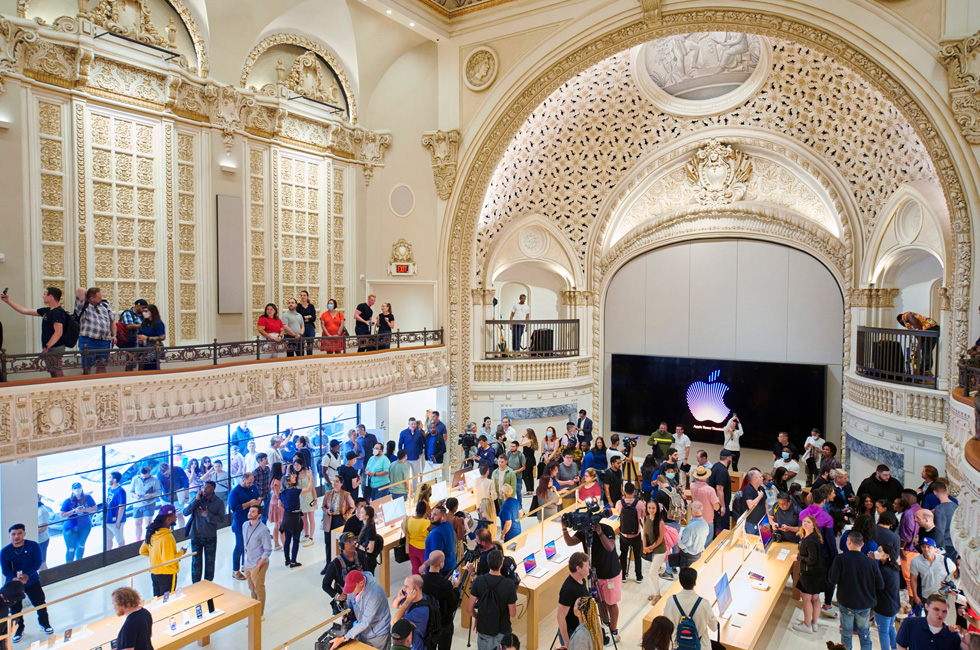 Customers gather on Apple Tower Theatre’s main sales floor on opening day.