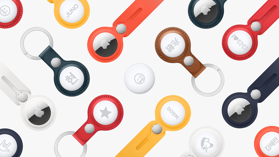 Array of AirTag accessories, personalised with various emoji and text.