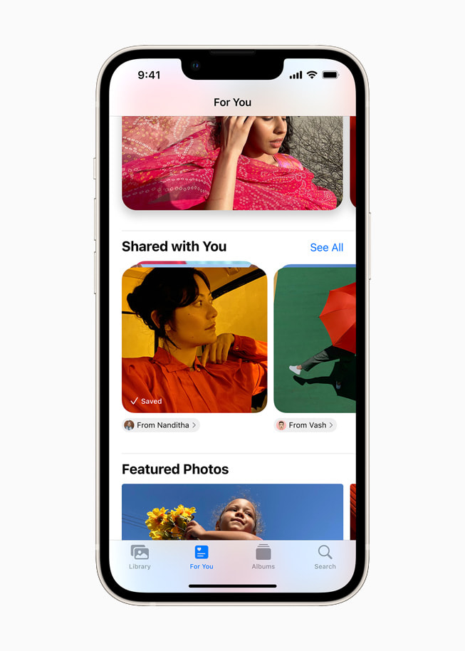 iOS 15’s Shared with You section in the Photos app on a starlight iPhone 13.