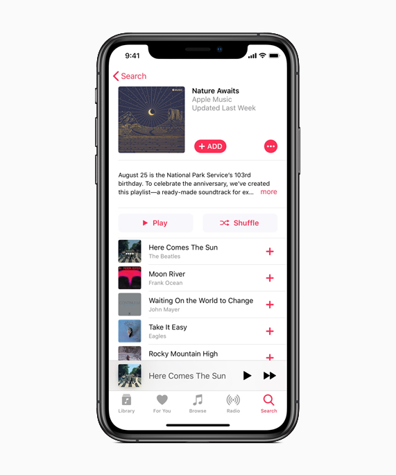 iPhone showing “Nature Awaits” playlist on Apple Music.