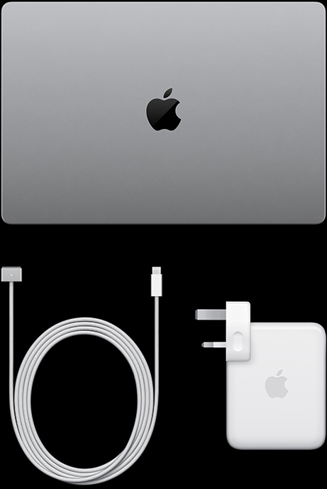 MacBook Pro with PROLED XDR Display, silver color, top, closed, USB-C charging cable and power adapter