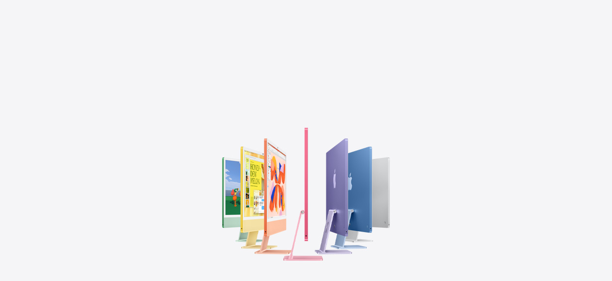 iMac เจ็ดรุ่นในสีเขียว เหลือง ส้ม ชมพู ม่วง ฟ้า และเงินจัดเรียงเป็นรูปหีบเพลง