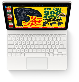iPad Air ve beyaz renkte Magic Keyboard’un tepeden görünümü.
