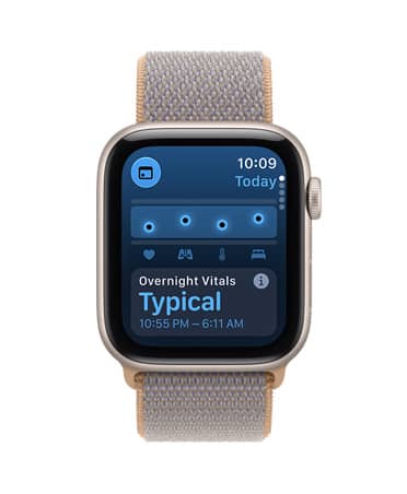 Apple Watch SE 3, screen shows overnight vitals, aluminium case, starlight colour, right side exterior, Digital Crown dial, connected to Sport Loop strap, chambray blue colour (light blue-gray)