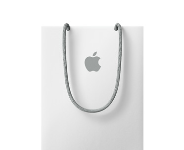 白色禮品提袋，中央有 Apple 標誌，灰色繩子提把