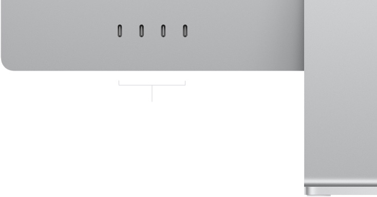 Rear exterior of iMac, lower left corner, four Thunderbolt 4 ports
