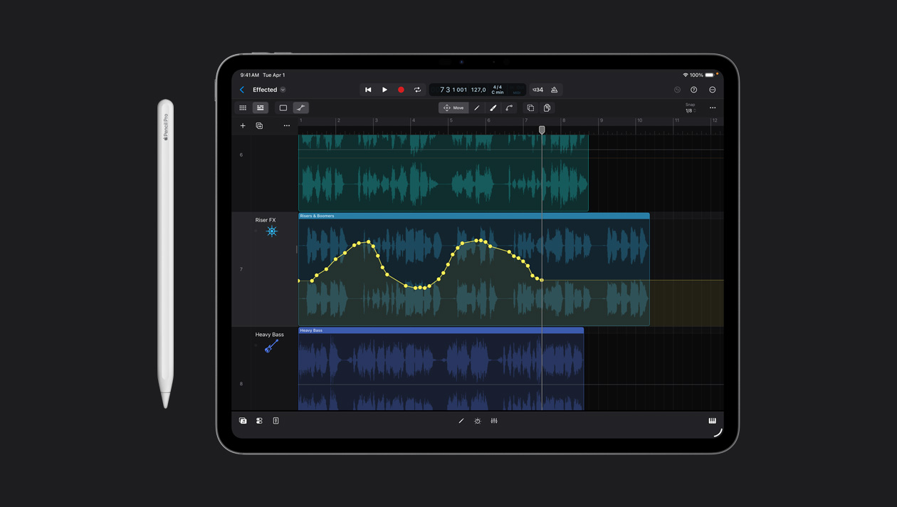 iPad Pro 13 screen workspace showing drawing over the soundwave in Logic Pro, Apple Pencil to the left of device